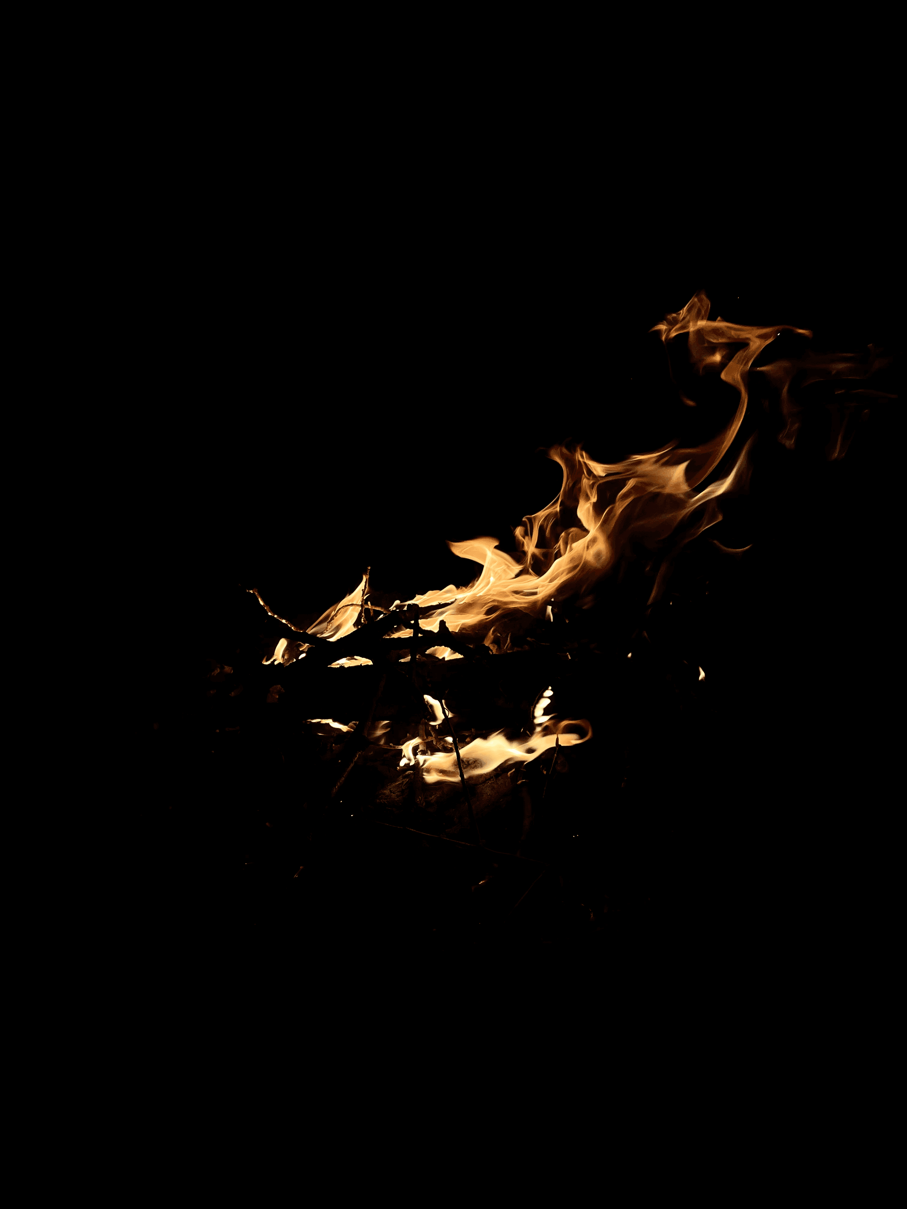 A flame during a summer bonfire