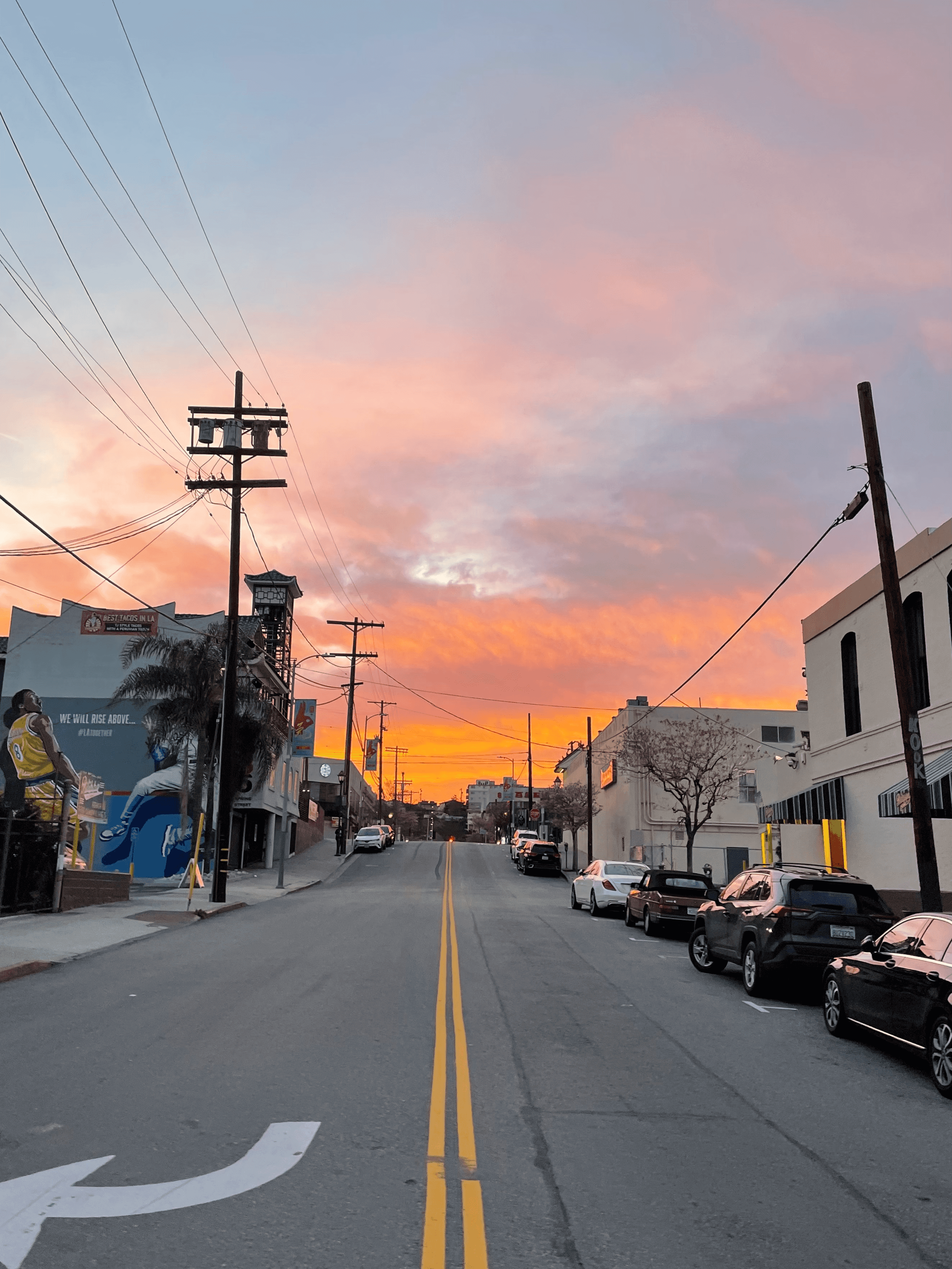 Sunset while crossing a street in Chinatown